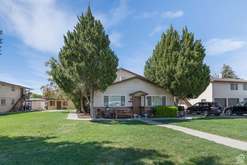 View of front of home with a front yard