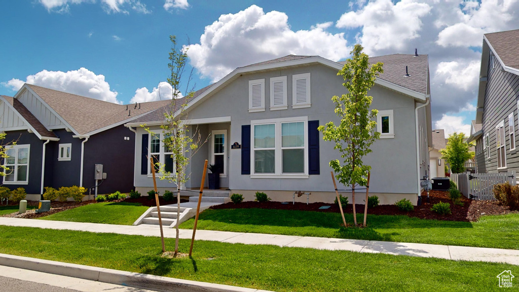 View of front of house with a front lawn