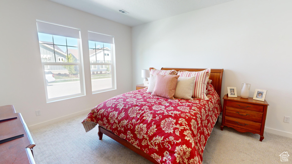 Bedroom featuring carpet flooring