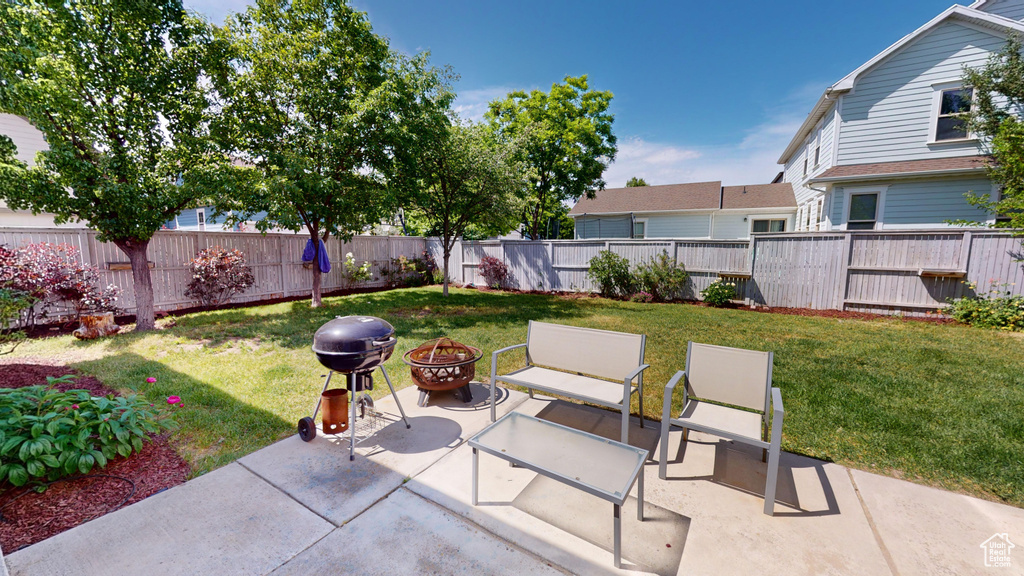 View of terrace with a fire pit