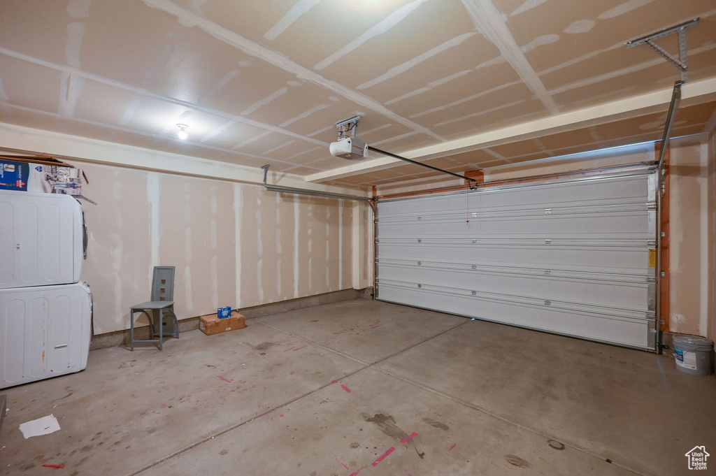 Garage featuring a garage door opener