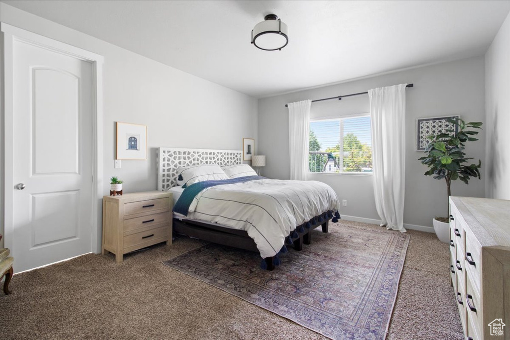 Bedroom with carpet flooring