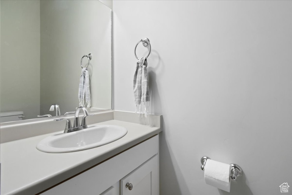 Bathroom featuring toilet and vanity