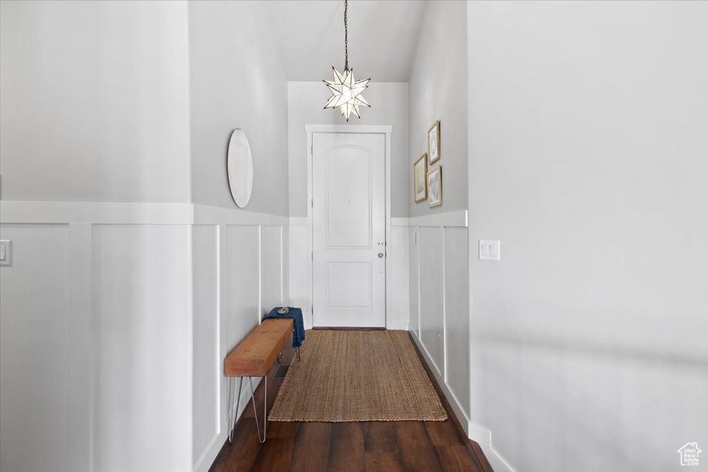 Entryway with hardwood / wood-style flooring