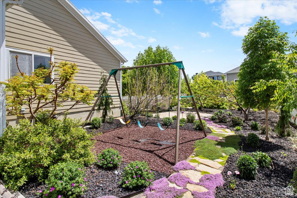 View of yard with a playground