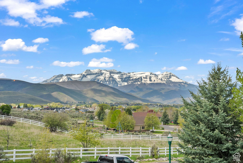 Property view of mountains with a rural view