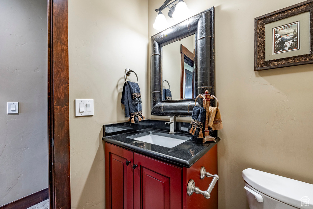 Bathroom with toilet and vanity