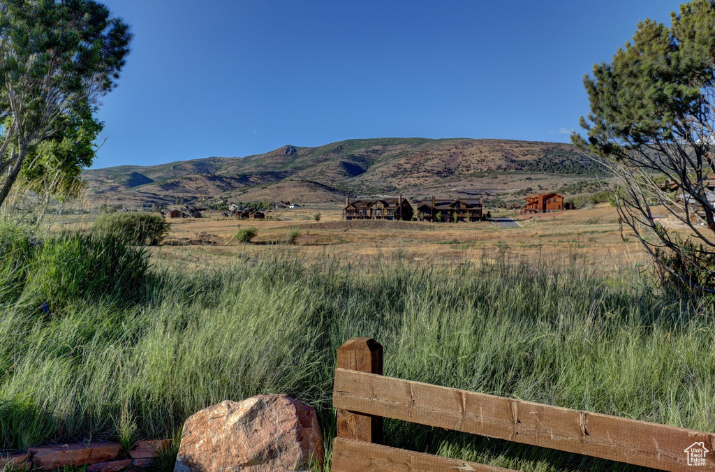 Property view of mountains with a rural view