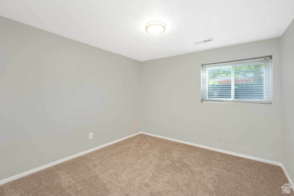 Unfurnished room featuring carpet floors