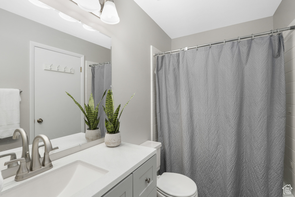 Bathroom with vanity and toilet