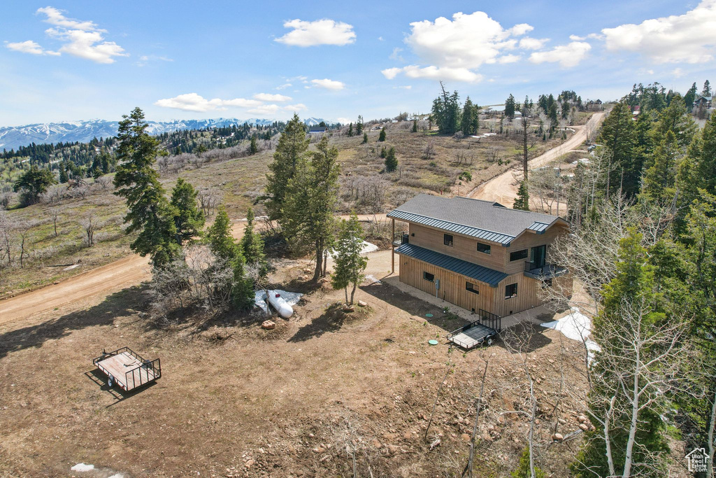 Birds eye view of property featuring a rural view