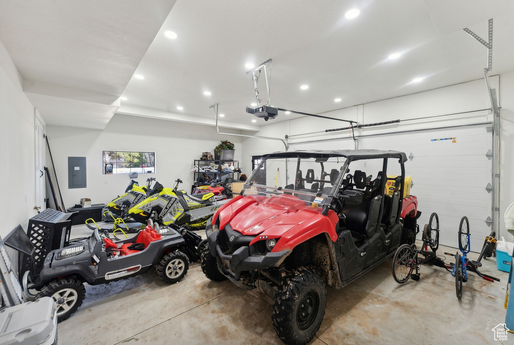 Garage featuring a garage door opener