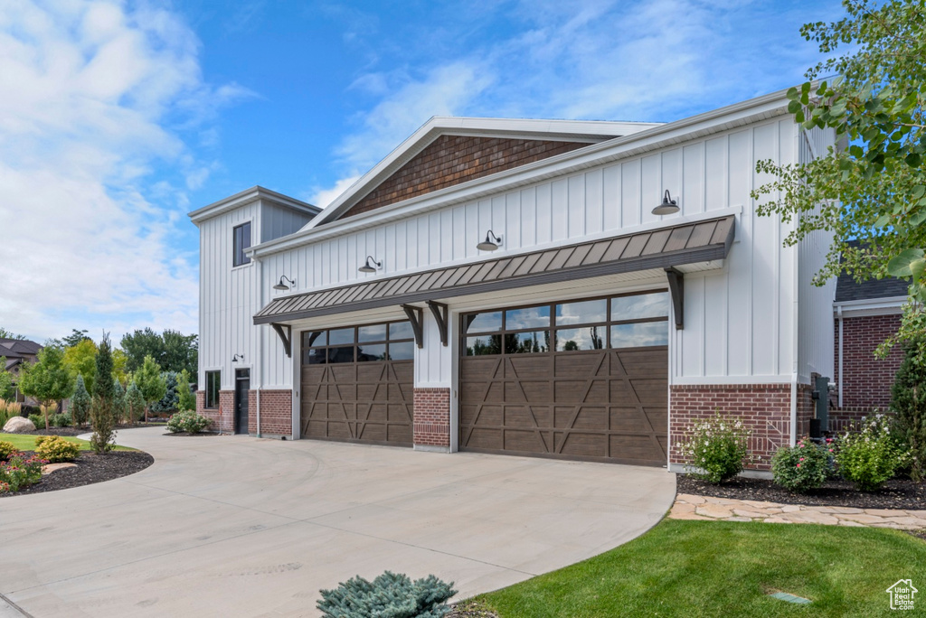 Modern farmhouse style home with a garage