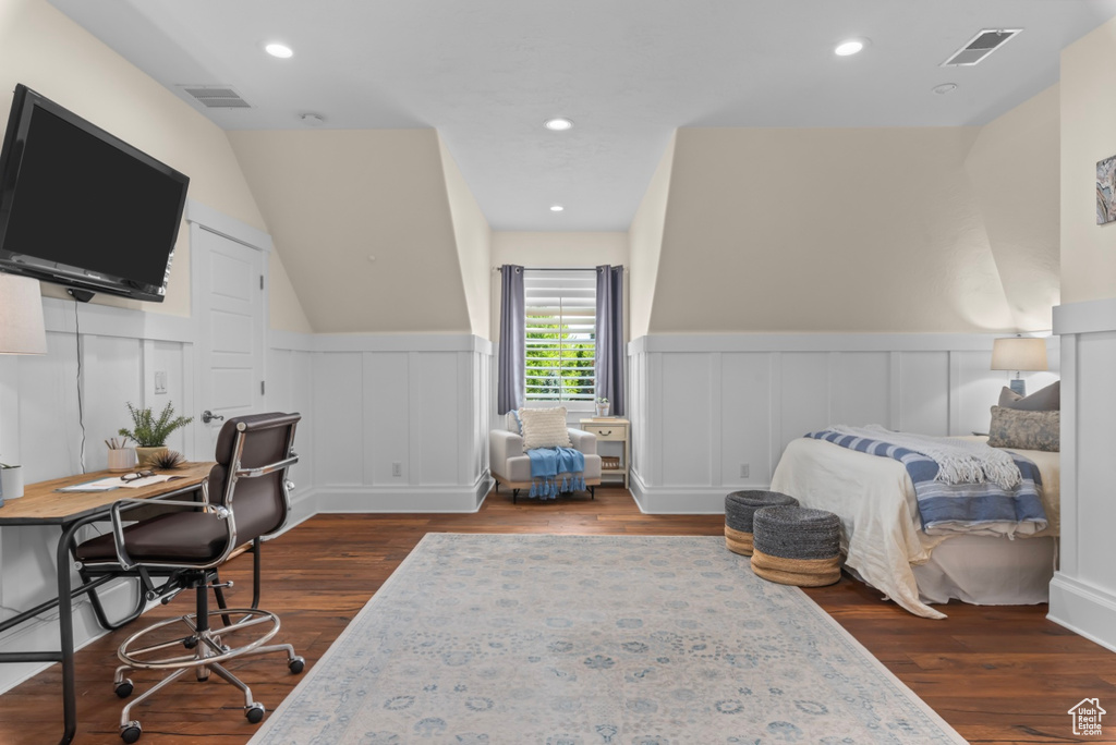 Bedroom featuring dark hardwood / wood-style flooring