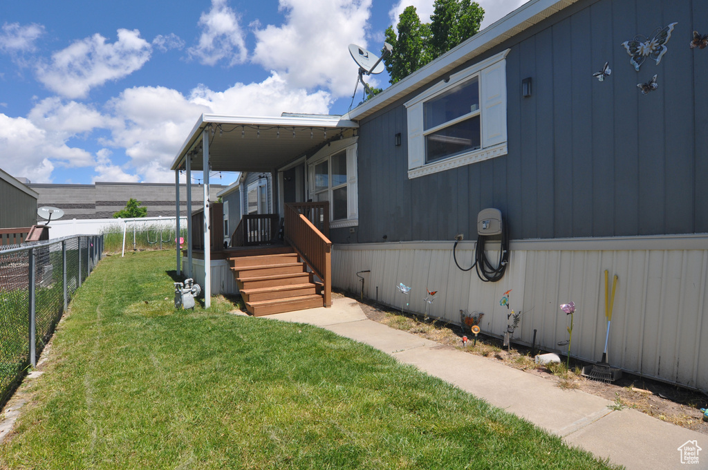 Exterior space with a front lawn