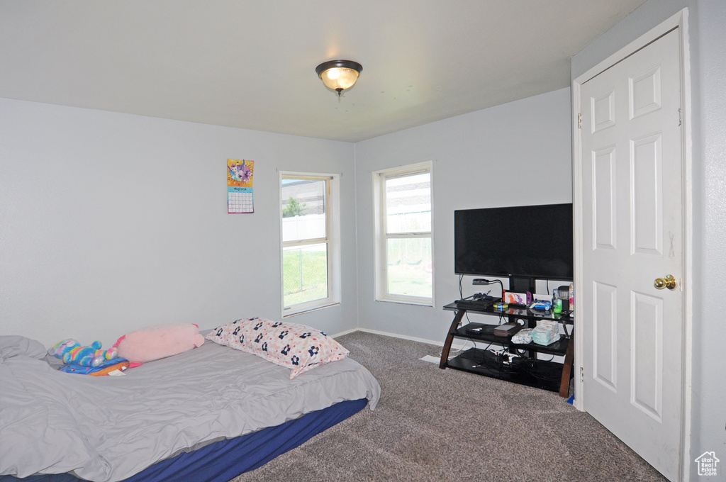 View of carpeted bedroom