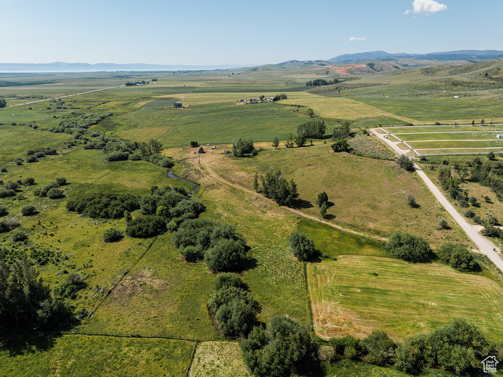 Birds eye view of property with a rural view