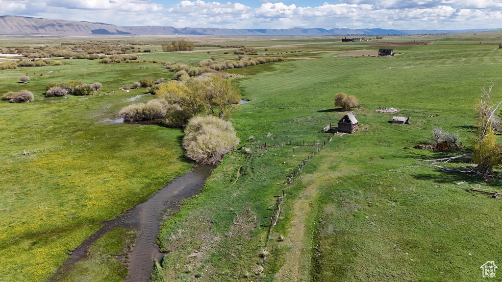 Drone / aerial view featuring a mountain view and a rural view
