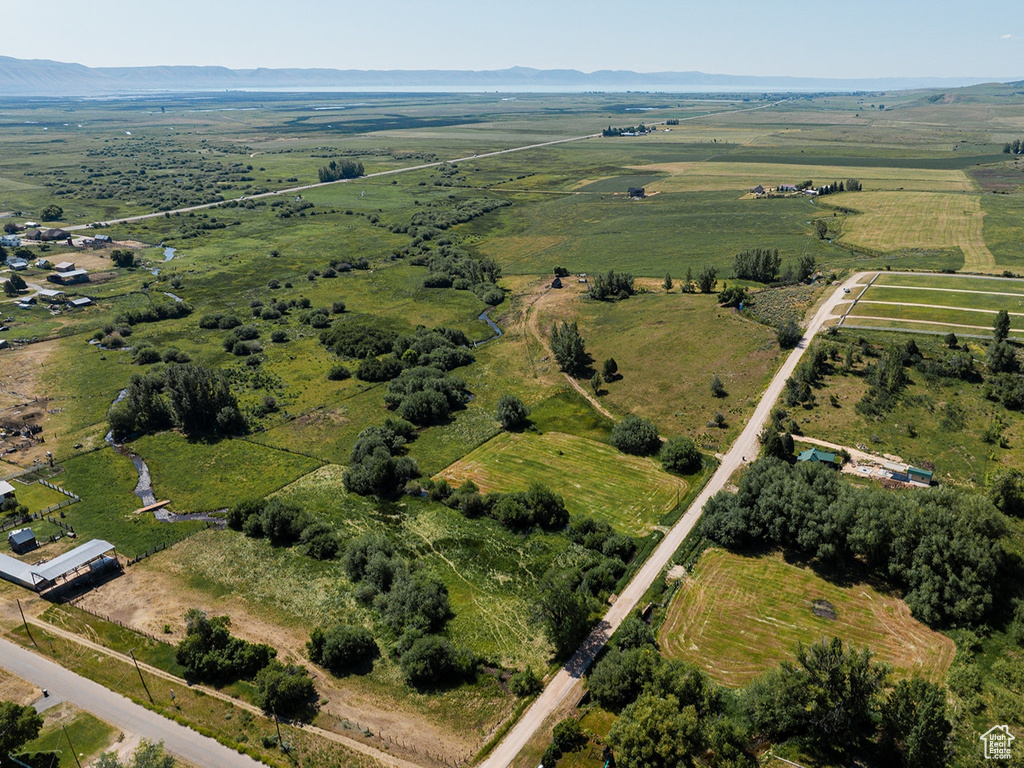Birds eye view of property with a rural view
