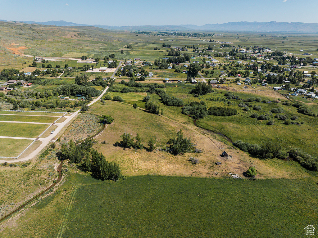 Drone / aerial view featuring a mountain view and a rural view