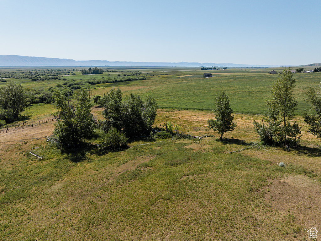 Birds eye view of property with a rural view