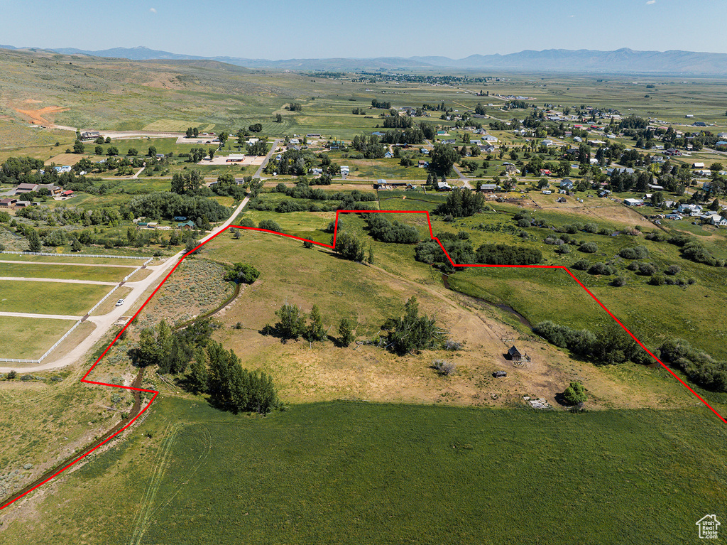 Aerial view with a mountain view and a rural view