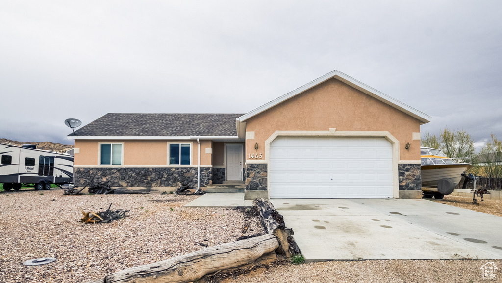 Ranch-style home with a garage