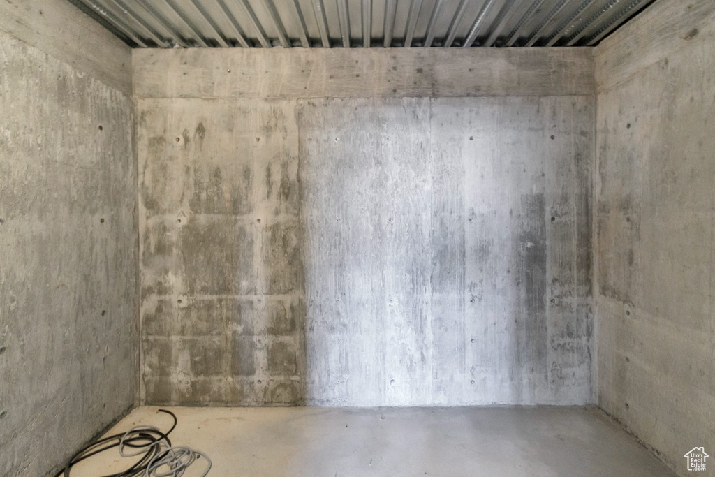 Interior space featuring concrete flooring