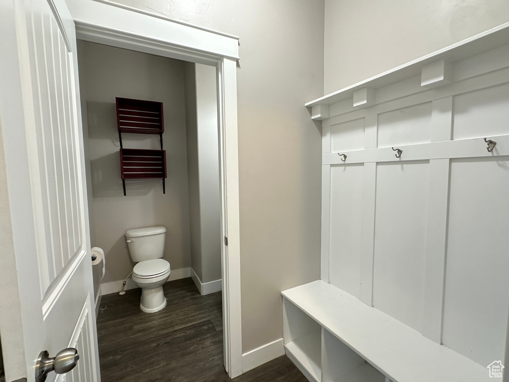 Mudroom with dark hardwood / wood-style floors