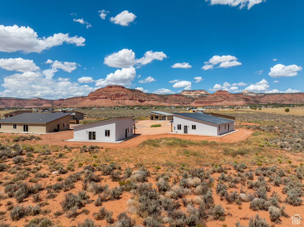 View of side of home featuring a mountain view