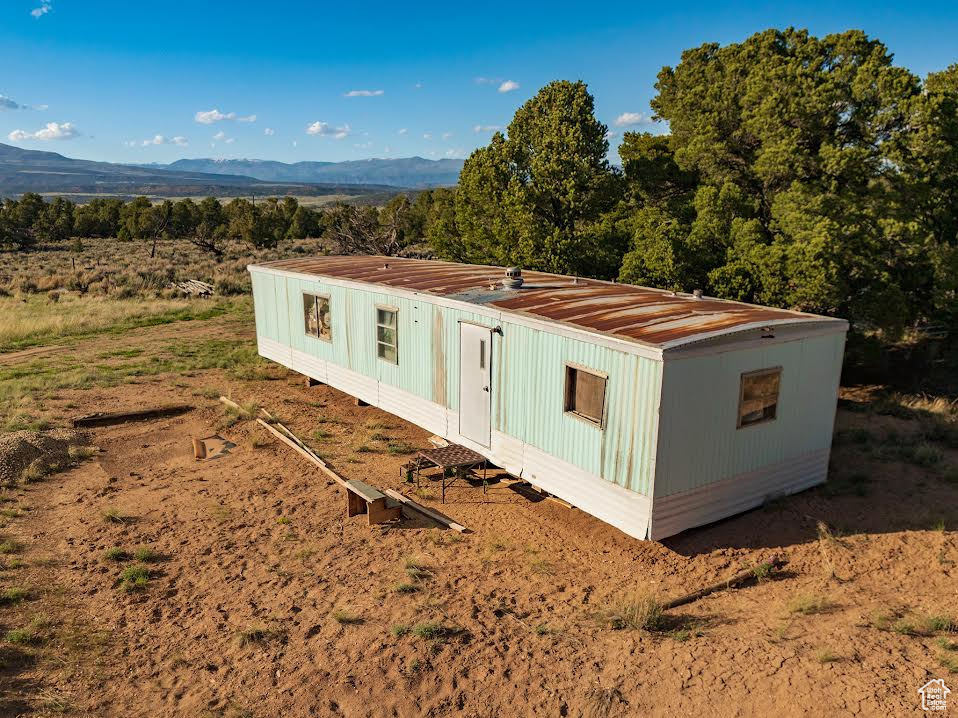 View of front of home with a mountain view