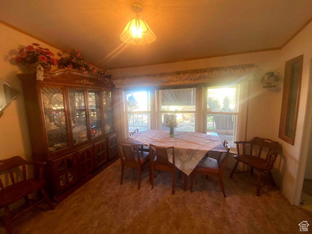 Dining room featuring lofted ceiling