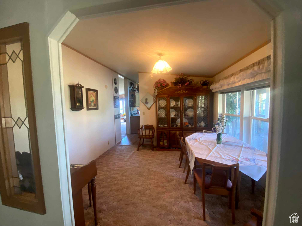 View of carpeted dining room