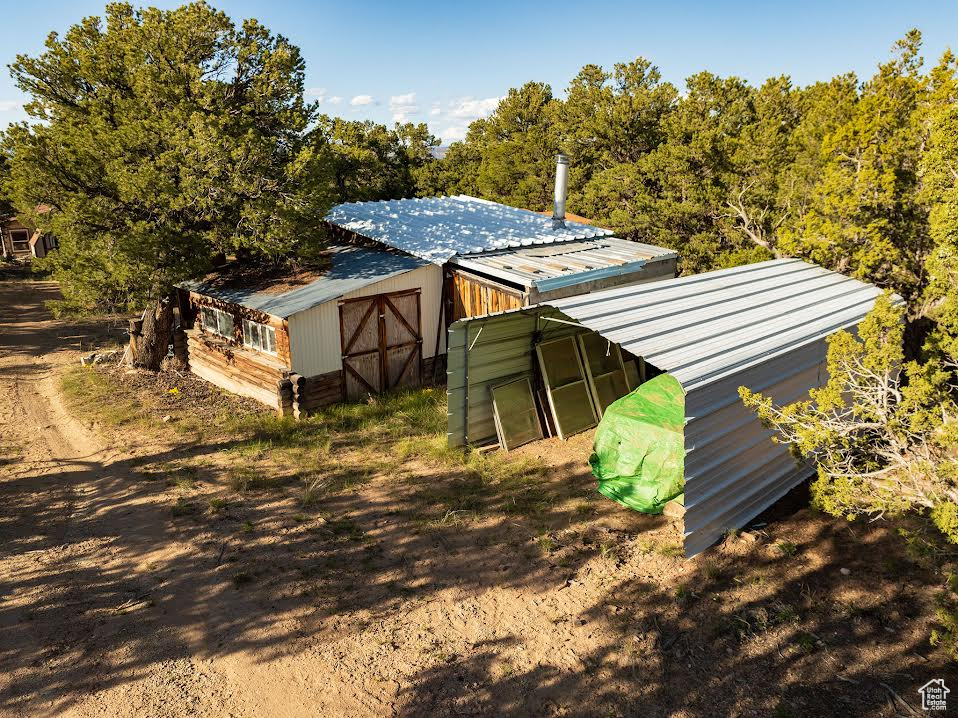 Exterior space featuring an outdoor structure