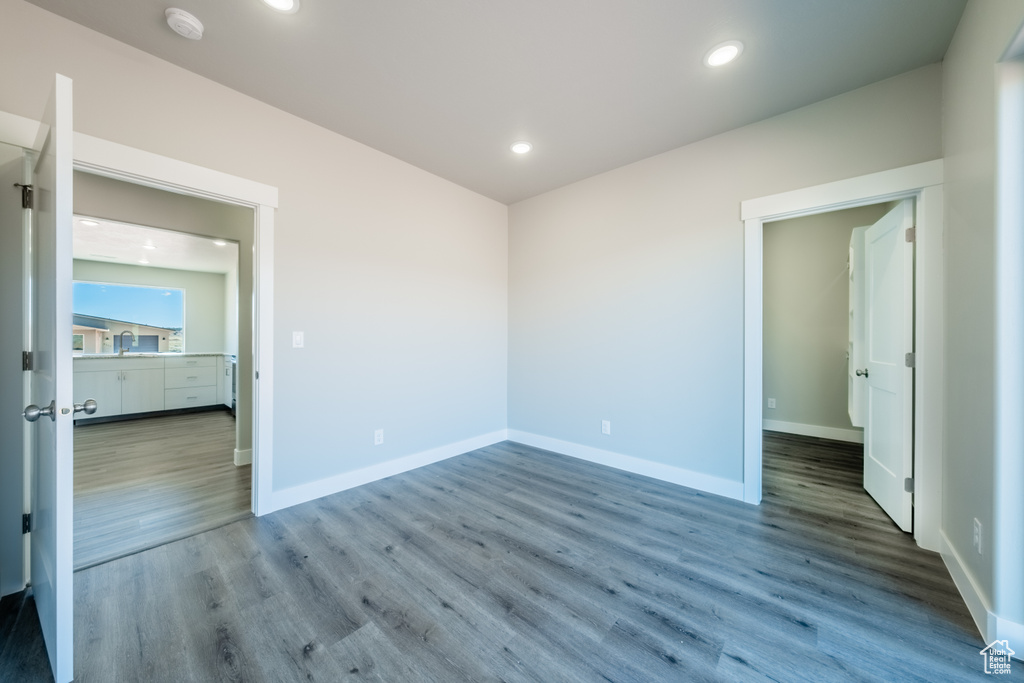 Spare room featuring hardwood / wood-style floors