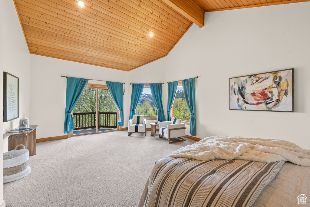 Bedroom featuring carpet flooring, access to exterior, beam ceiling, wood ceiling, and high vaulted ceiling