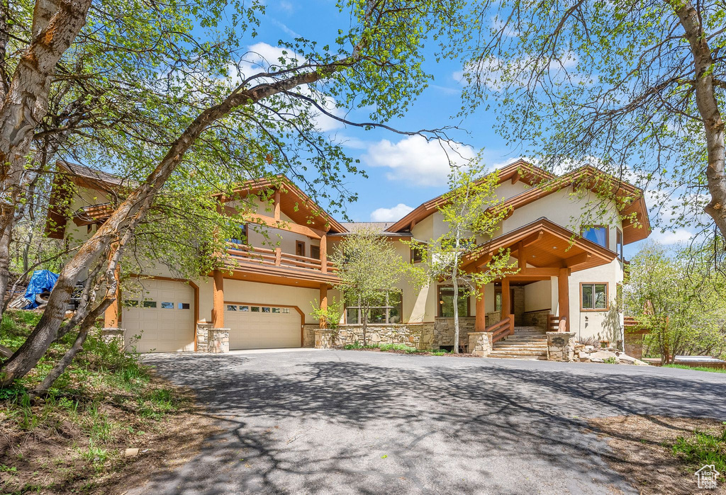 View of front of property featuring a garage