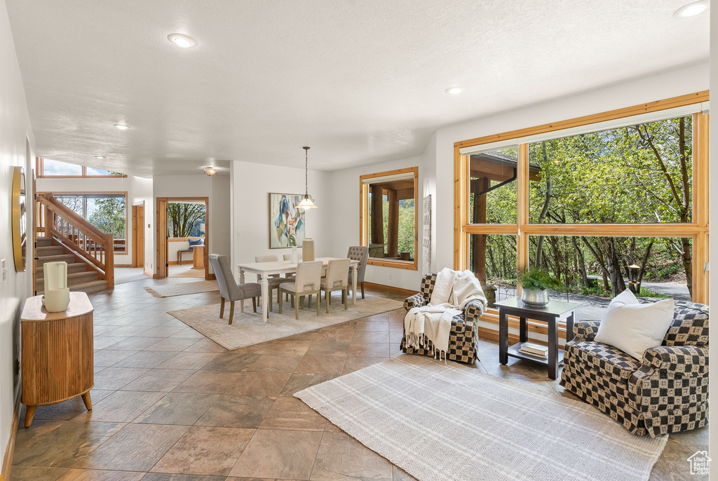 Tiled living room with a healthy amount of sunlight