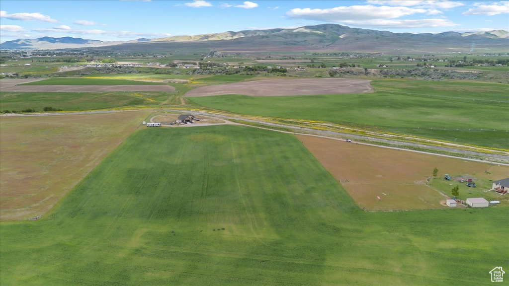 Drone / aerial view featuring a rural view and a mountain view