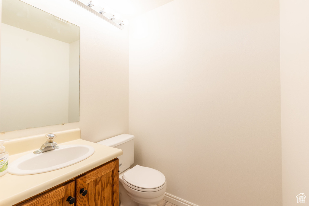 Bathroom with vanity and toilet