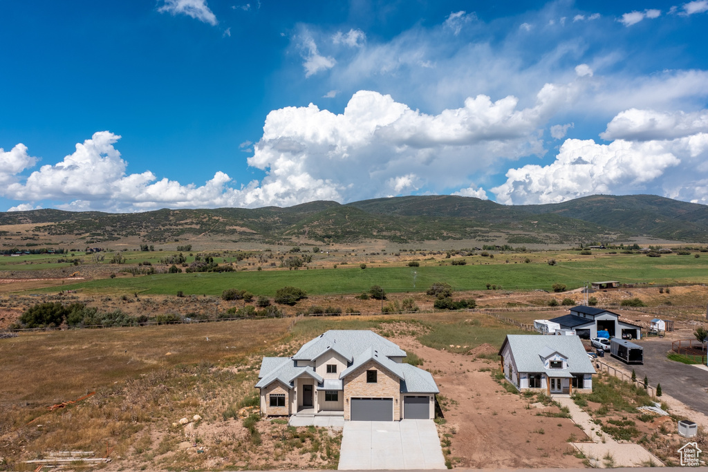 Property view of mountains featuring a rural view