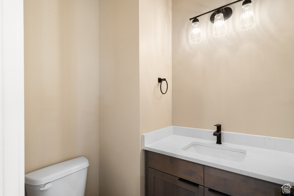 Bathroom with vanity and toilet