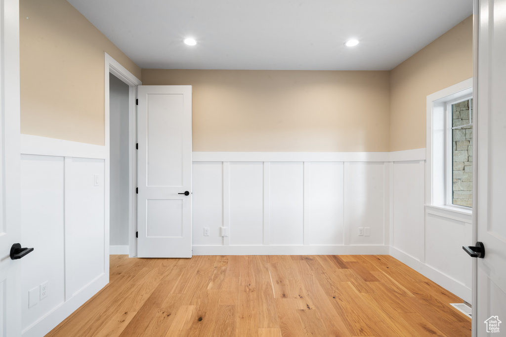 Spare room featuring light hardwood / wood-style flooring