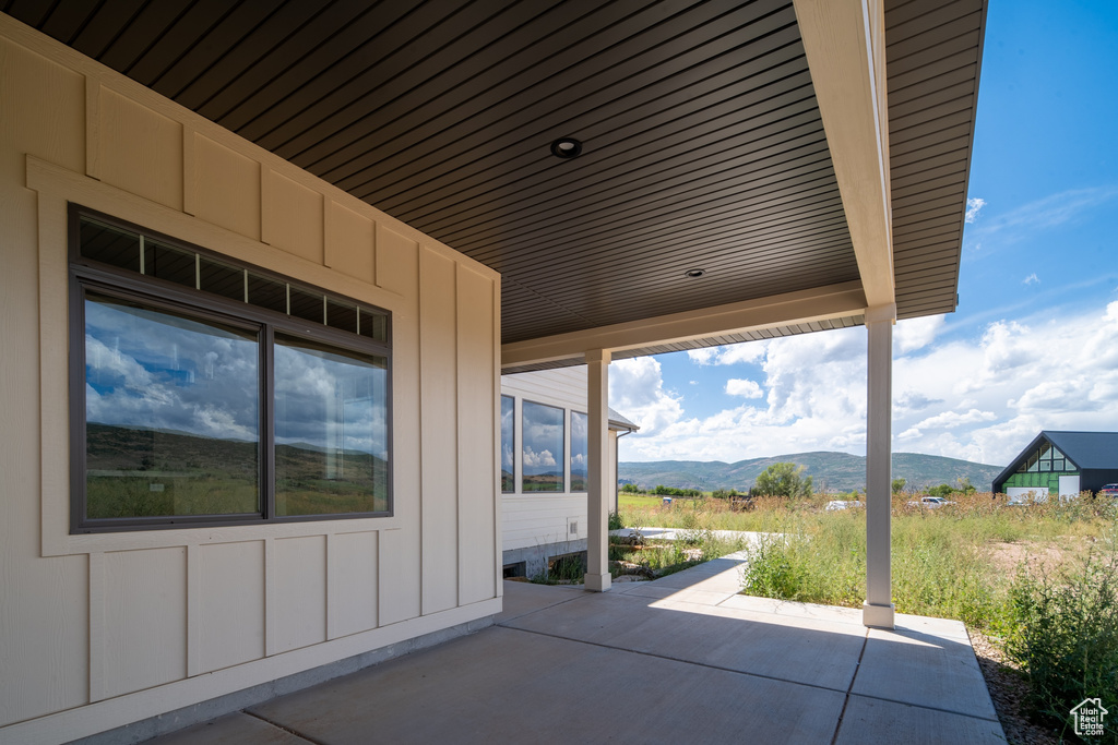 View of patio / terrace featuring a mountain view