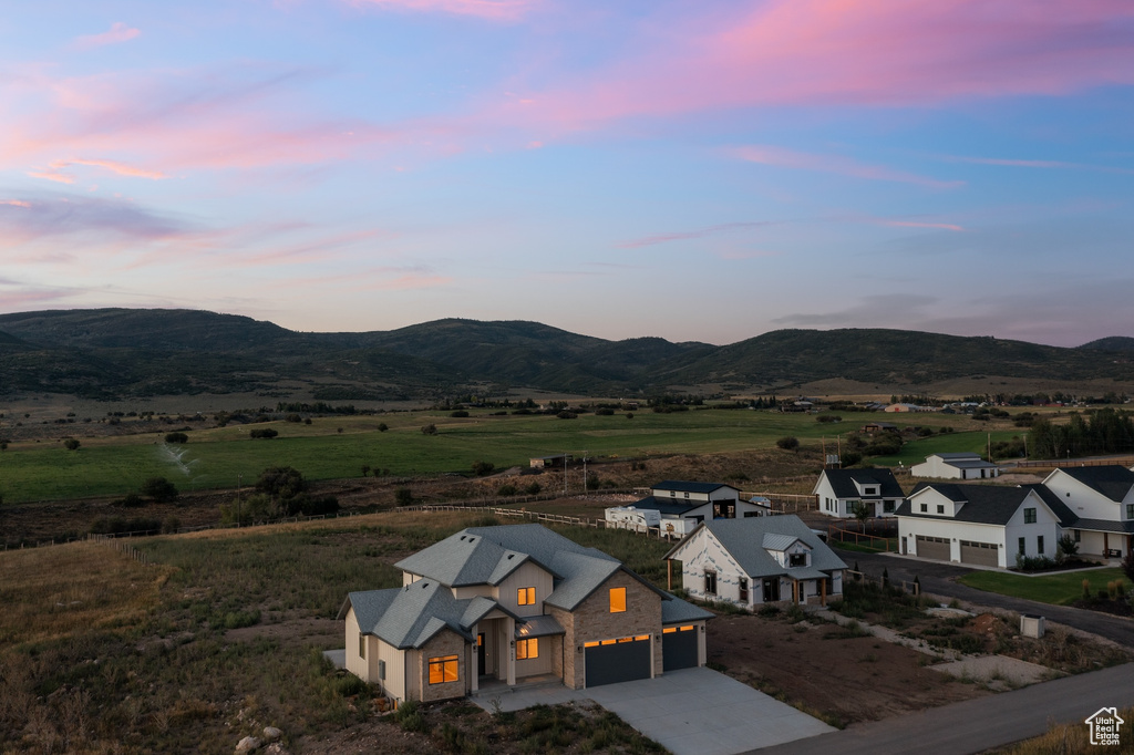 Aerial view at dusk with a mountain view