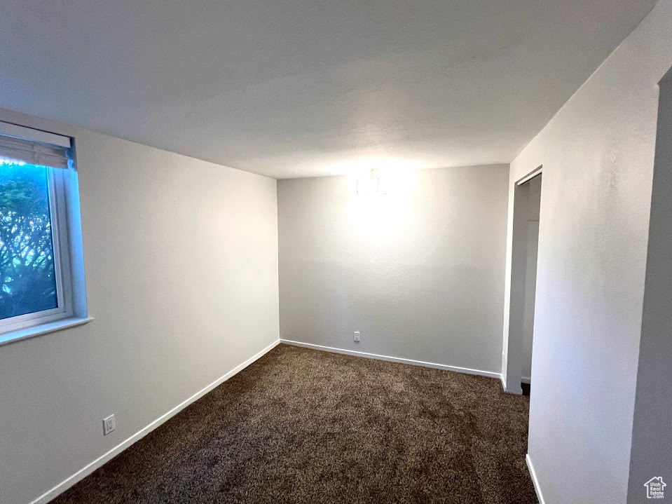 View of carpeted spare room