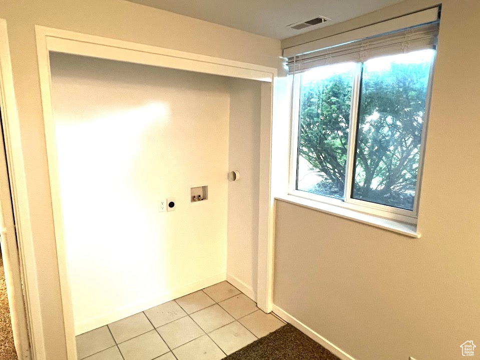 Interior space with light tile flooring