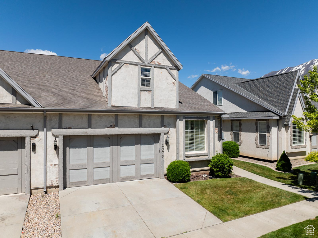 View of front facade with a garage