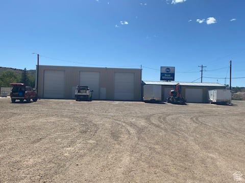 View of outdoor structure with a garage