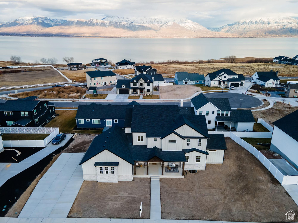 Birds eye view of property with a mountain view